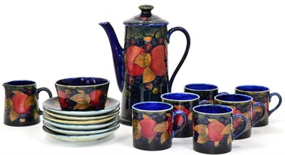 Lot 226 - William Moorcroft (1872-1945): A Pomegranate Pattern Coffee Service, comprising coffee pot and...