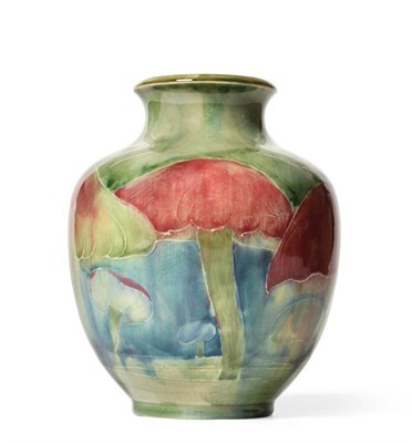 Lot 230 - William Moorcroft (1872-1945): A Claremont Toadstool Pattern Vase, green painted signature, printed