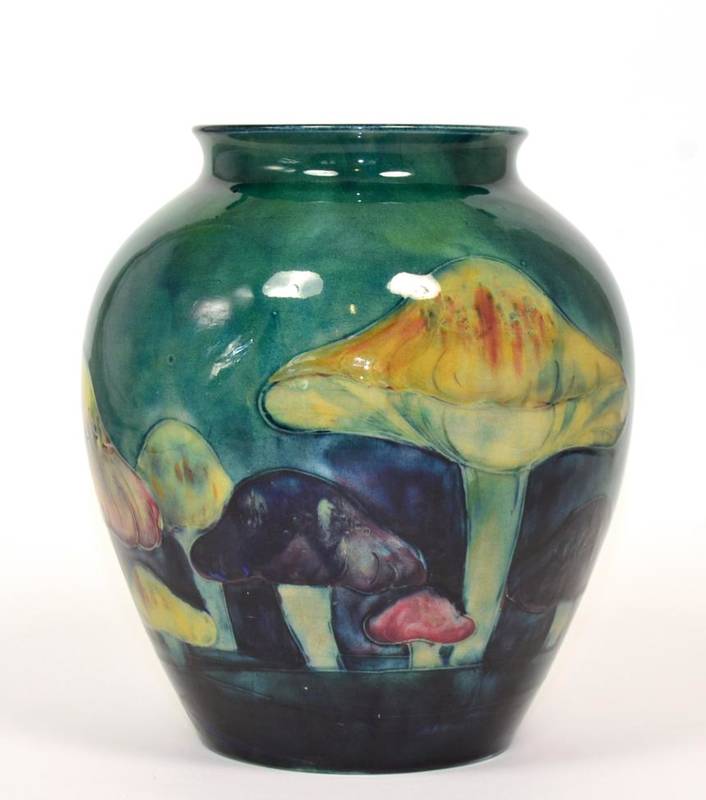 Lot 231 - William Moorcroft (1872-1945): A Claremont Toadstool Pattern Vase, green painted signature,...