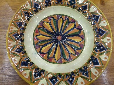 Lot 237 - A Della Robbia Pottery Earthenware Dish, decorated with repeating patterns, in green, yellow,...
