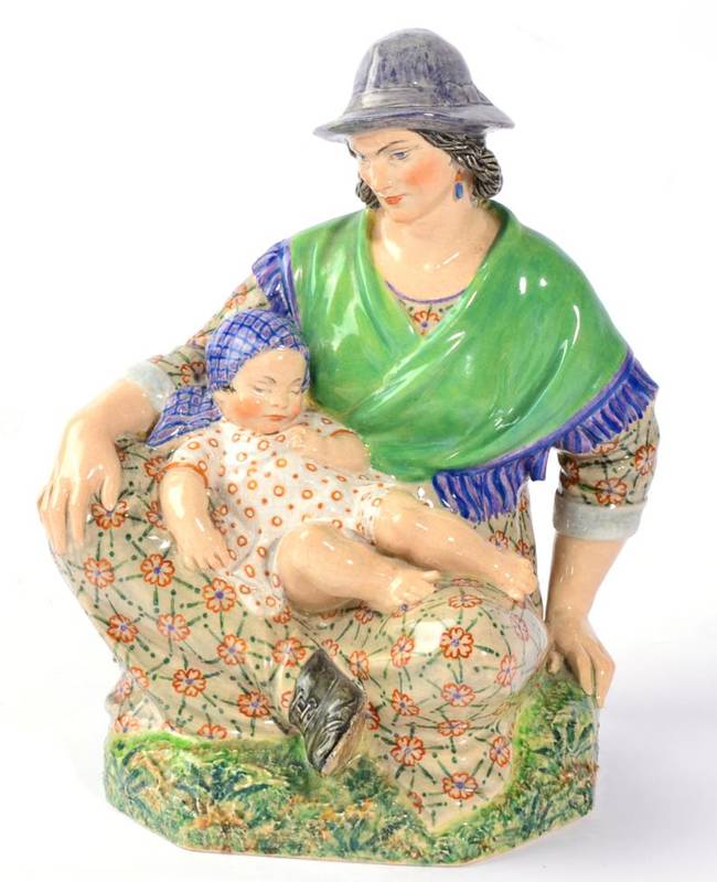 Lot 240 - Charles Vyse (1882-1971): The Midday Rest, A Chelsea Pottery Figure, modelled as a mother...