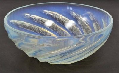 Lot 279 - René Lalique (French, 1860-1945): An Opalescent and Clear  Glass Poissons Bowl, the underside...