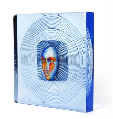 Lot 287 - Bertil Vallien (Swedish, 1938-) for Kosta Boda: A Headman Tile, painted head encased in blue glass