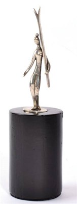 Lot 299 - A Hagenauer Silver Plated Figure of a Girl Skier, modelled carrying her skis, stamped with wHw logo