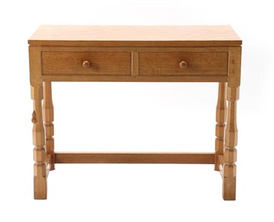 Lot 308 - Mouseman: A Robert Thompson English Oak Hall Table, the rectangular top above two drawers, on...