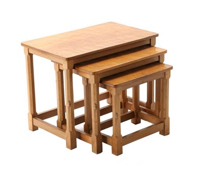 Lot 311 - Mouseman: A Robert Thompson English Oak Nest-of-Tables, on four octagonal legs, each with...
