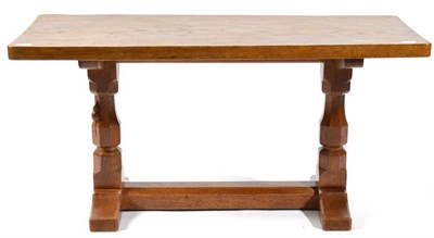 Lot 319 - Mouseman: A Robert Thompson English Oak 3ft Refectory Coffee Table, on two octagonal legs joined by