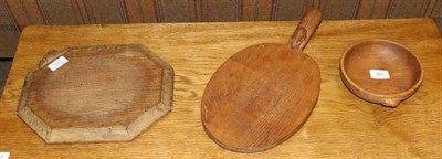 Lot 321 - Mouseman: A Robert Thompson English Oak Breadboard, each with carved mouse signature, 30.5cm; A...