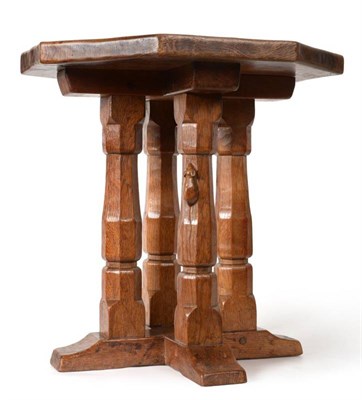 Lot 328 - Mouseman: A Robert Thompson English Oak Octagonal Coffee Table, on four octagonal legs and four...