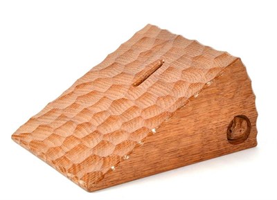 Lot 337 - Mouseman: A Robert Thompson English Oak Money Box Wedge of Cheese, with carved mouse signature,...