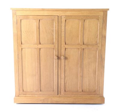Lot 362 - Cat and Mouseman: A Lyndon Hammell (Harmby) Panelled English Oak Cupboard, the rectangular top...