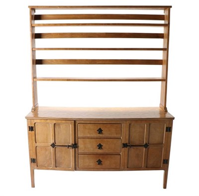 Lot 373 - Squirrelman: A Wilfrid Hutchinson (Husthwaite) English Oak Dresser, the open top section with three