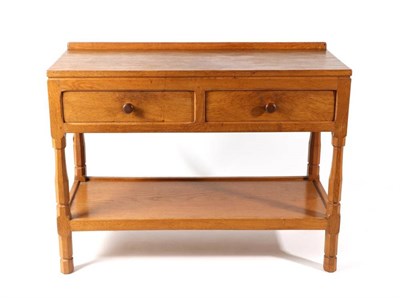Lot 380 - Squirrelman: A Wilfrid Hutchinson (Husthwaite) English Oak Serving Table, with raised upstand,...