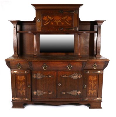 Lot 389 - Robson & Sons, Newcastle: An Arts and Crafts Oak Mirror Back Sideboard, the upper section with...