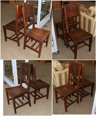 Lot 391 - A Set of Eight Arts and Crafts Oak Dining Chairs, the slatted and panel backs with carved...