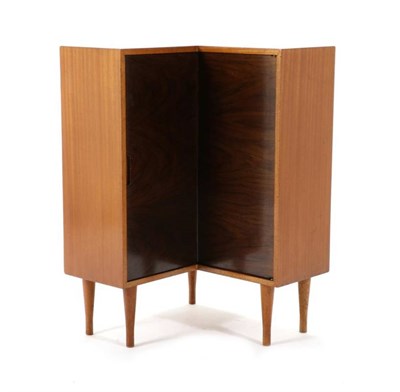 Lot 402 - A 1970s Danish Teak Free-Standing Corner Cupboard, with double hinged concertina action door...