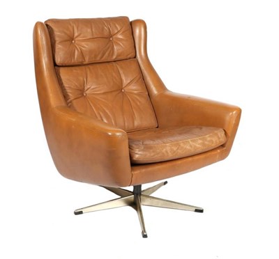 Lot 419 - A 1970s Orange Tan Leather Bucket Shaped Swivel Armchair, with buttoned seat and back, on five...