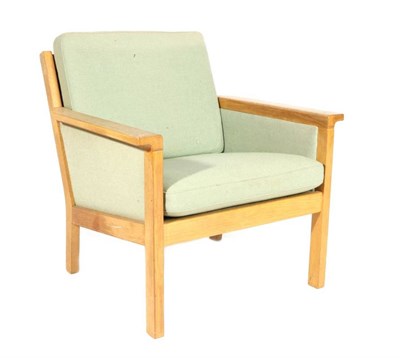 Lot 421 - Hans J Wegner for Getama: A 1960s Oak Framed Lounge Chair, with original green cloth upholstery and