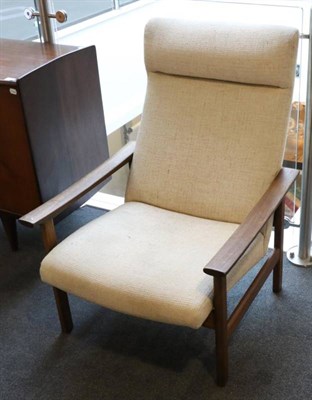 Lot 422 - A 1970s Parker Knoll Teak Framed Armchair, in cream fabric, the frame stamped Parker-Knoll...