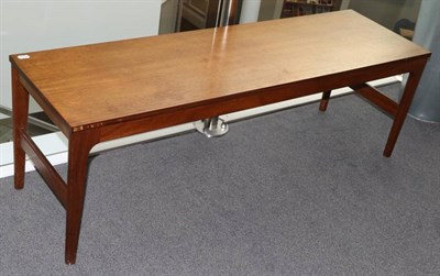 Lot 428 - A 1970s Teak Extending Coffee Table, unmarked, of rectangular form, the two extending leaves...