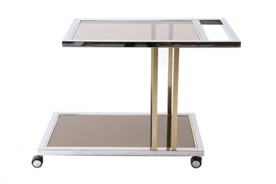 Lot 430 - A 1970s Chromed and Bronzed Metal Two-Tier Serving Trolley, with smoked glass panels and square...