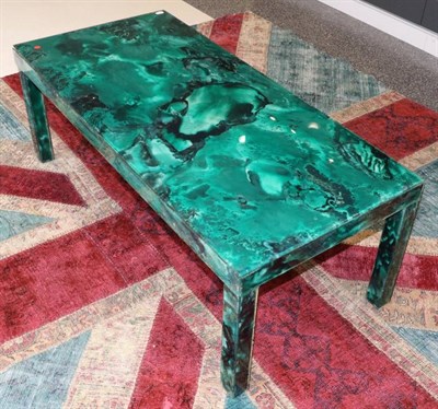 Lot 433 - A 1970s Green Glass Malachite Effect Coffee Table, on square form legs, 121cm by 56cm by 45cm