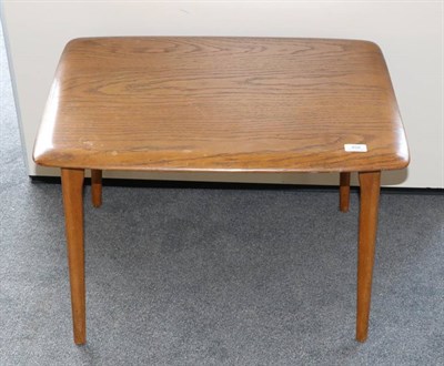 Lot 458 - An Ercol Originals Style Elm Rectangular Coffee Table, on spindle legs joined by a stretcher,...