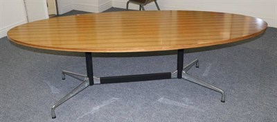 Lot 482 - Eames: A Vitra Eames Laminate Oval Dining Table, modern, on black metal tubular supports with...