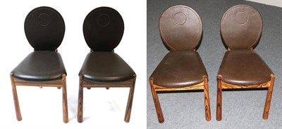 Lot 519 - A Set of Four Brown Leather Dining Chairs, modern, with oval back supports above padded seats,...