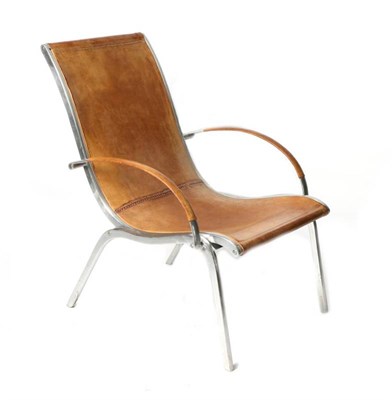 Lot 524 - A Brown Leather and Metal Framed Le Corbusier Style Lounge Chair, late 20th century, with...