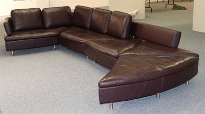 Lot 530 - Ralph Benz: A Burgundy Leather Modular Corner Sofa, modern, in five sections, with five...