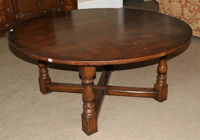 Lot 540 - A Titchmarsh & Goodwin Circular Oak Dining Table, modern, unmarked, on baluster turned legs...