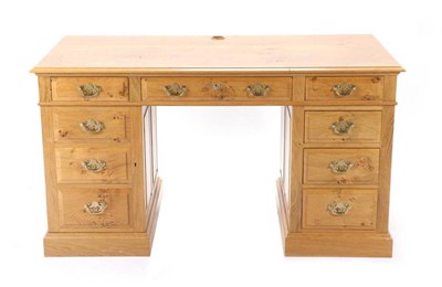 Lot 551 - A Titchmarsh & Goodwin Burr Oak Double Pedestal Writing Desk, modern, the central drawer with...