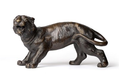 Lot 224 - A Japanese Bronze Tiger, Meiji period, naturalistically modelled, seal mark, 27cm long See...