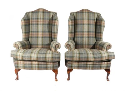 Lot 575 - A Pair of Tartan Tweed Upholstered Wing Back Armchairs, modern, with close-nailed rounded arms...