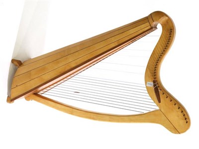 Lot 1033 - Clarsach (Celtic Harp) 34 string with tuning key, made from a variety of woods 114cm high