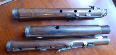 Lot 1039 - Monzani Rosewood Flute six hole, six keys with three sections stamped 'Monzani', centre section...
