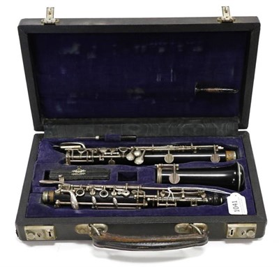 Lot 1041 - Oboe, conservatoire system, with fully automatic octave key, wooden body but bears no makers...