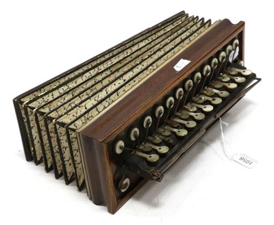 Lot 1058 - Flutina with 26 buttons and levers, bellows in useable condition but has some wear