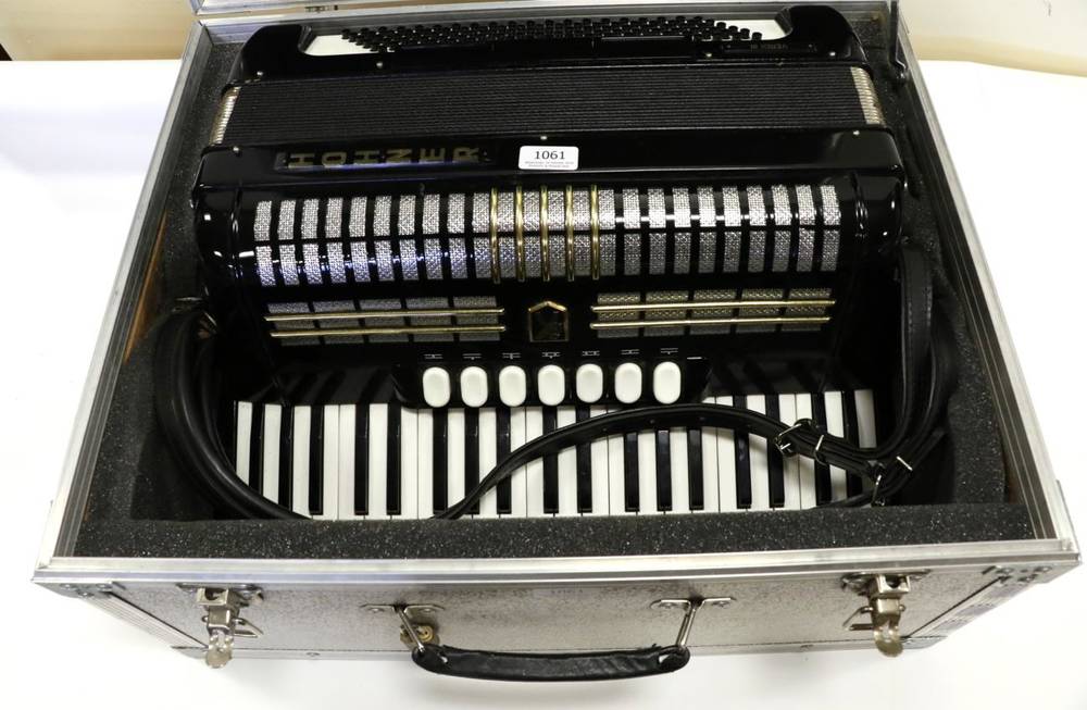Lot 1061 - Hohner Verdi III Accordion 120 bass buttons, 41 piano keys, five couplers and three bass...