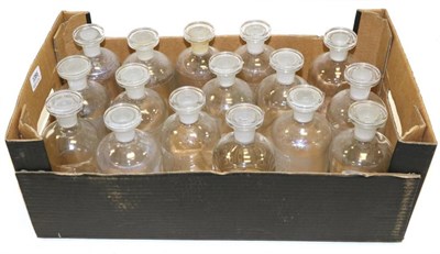 Lot 1086 - Glass Chemical Jars a collection of 16 clear glass examples with etched labelling, all with...
