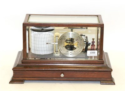 Lot 1088 - Lawrence & Mayo (London) Barograph with eight vacuum sections, circular dial indicting current...