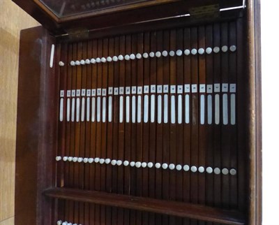 Lot 1105 - Microscope Slide Cabinet with 56 drawers in two columns each 12 1/4x11'', 31x28cm in mahogany...