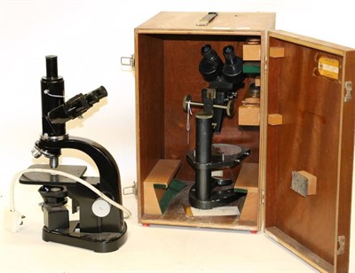 Lot 1106 - Microscopes (i) Leitz Binocular no.704504 with four lens turret, course/fine focusing, under...