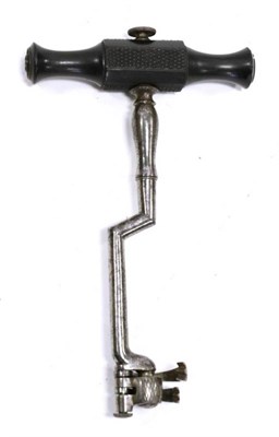 Lot 1138 - Steel and Ebony Dentist's Tooth Key, early 19th century, with double claw, 16cm long