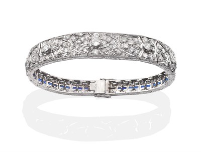 Lot 325 - An Art Deco Diamond and Sapphire Bracelet, a central panel of articulated pierced links set...