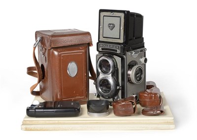 Lot 1249 - Rolleiflex Model T Camera Grey no.2143865, with Carl Zeiss Tessar f3.5 75mm lens, in leather...