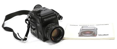 Lot 1250 - Rolleiflex SL2000F Camera no.702330018 with Rollei HFT Planar f1.8 50mm lens and booklet