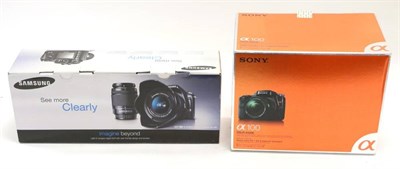 Lot 1255 - Sony DSLR A100K Camera with DT f3.5-5.6 18-70mm lens (boxed) together with a Samsung GX D-Xenon...