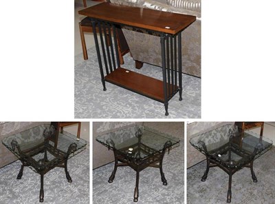 Lot 585 - A Set of Three Bronzed Effect Metal and Glass Top Lamp Tables, Modern, with splayed legs and...